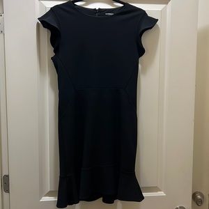 Black express work dress. Mid length with short sleeves